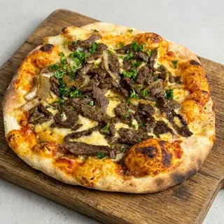 Beef shawarma pizza with grilled onion