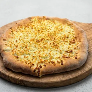 Cheese manouche baked in a wood fired oven
