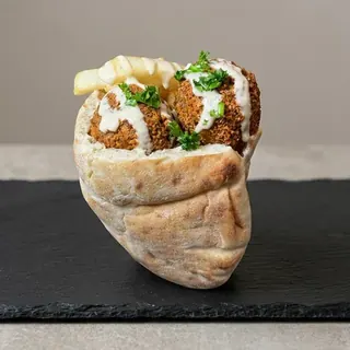 Falafel sandwich in pita with tahini