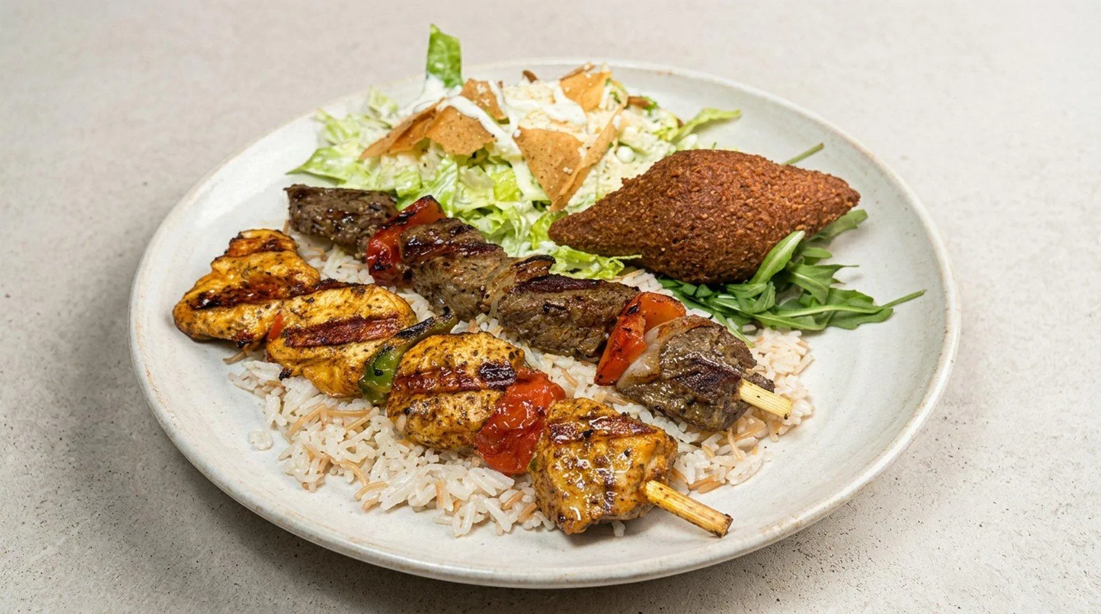 Mixed grill platter with chicken and beef skewers from Zaytona Grill