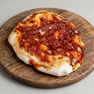 Onion in tomato sauce manouche