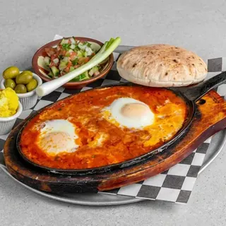 Shakshuka at Zaytona Grill: poached eggs in spiced tomato sauce