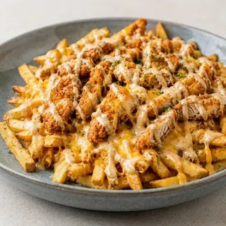 Zaytona mix fries with crispy chicken and house sauce