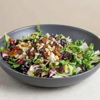 Zaytona salad with olives, nuts and pomegranate molasses